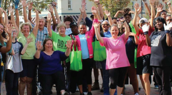 Volunteers celebrating after a clean-up event