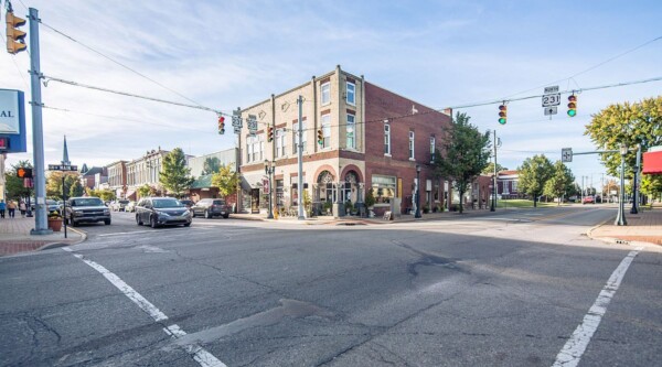 Historic brick building at an intersection in Huntingburg, Indiana