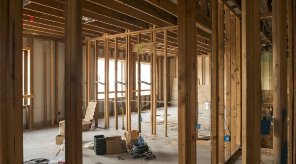 Interior of the Kern building during rehabilitation in 2017 showing exposed beams and wood.