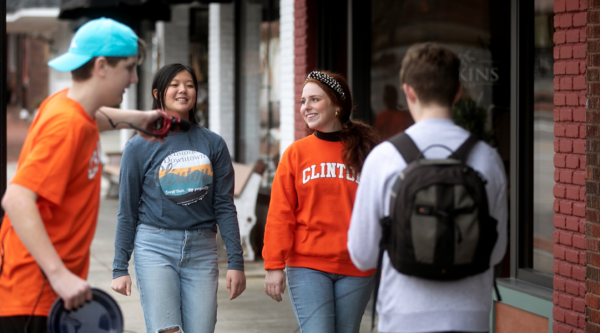 Young people filming a promotional video downtown