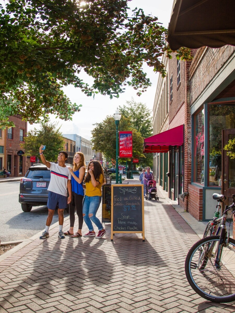 Group of people taking a selfie in downtown Toccoa, Georgia.