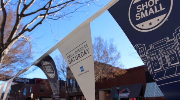 Small Business Saturday and Shop Small bunting hung in downtown scene.