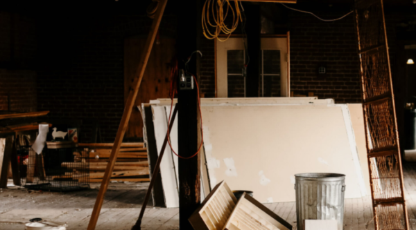 Renovations in progress in The Depot District. Construction materials fill a large historic space.