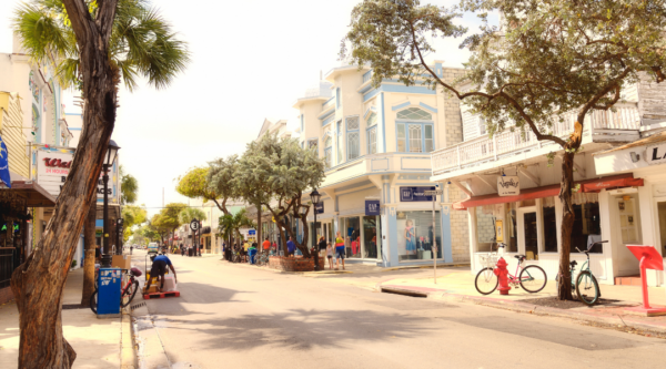 Historic Main Street with shops and tree-lined sidewalks