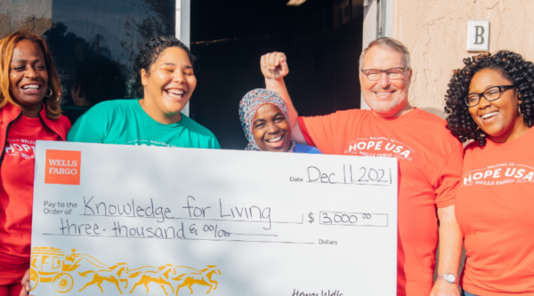 Commissioner Regina Hill, Natasha Gaye, Aminah Hamidullah (business owners and micro-grant recipient), Mayor Buddy Dyer, and Candice Simmons (Wells Fargo)