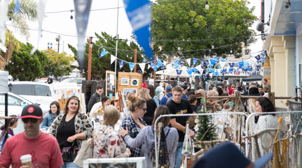 Oceanside residents lined the street at the Merry Makers Fair, a free, two-day holiday pop-up market